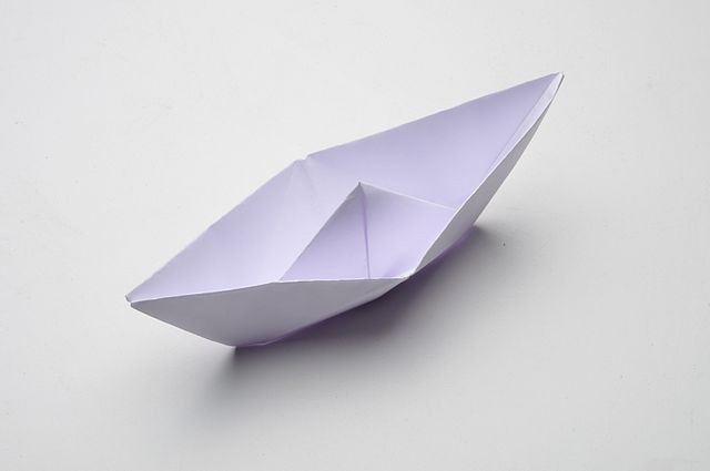 paper ship drifting